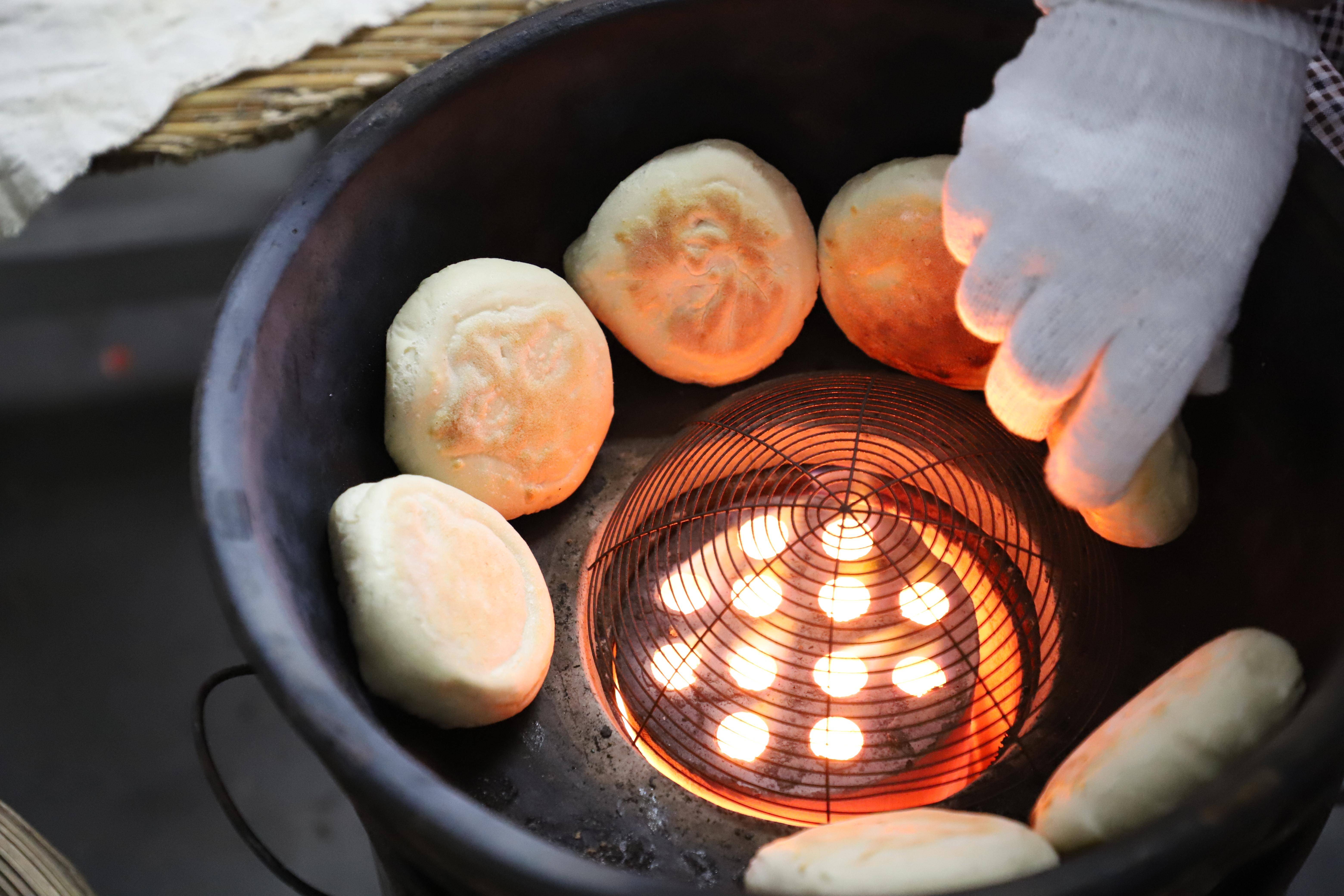 沁阳：祭灶火烧吃出别样味道